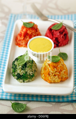 Rice in four colours. Recipe available. Stock Photo