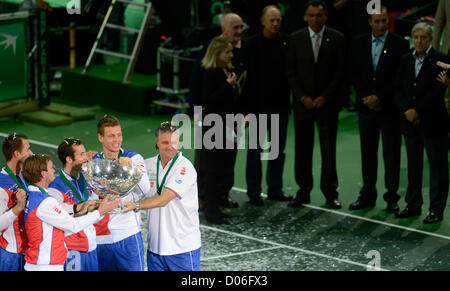 Czech Republic's Davis Cup team members hold the Davis Cup trophy and members of Davis Cup team from 1980 are back in Prague, Czech Republic, Sunday, November 18, 2012. The Czech Republic won the 2012 Davis Cup trophy by beating Spain 3-2. (CTK Photo/Michal Kamaryt) Stock Photo