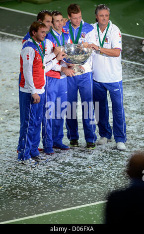 Czech Republic's Davis Cup team members, from left to right, Ivo Minar, Lukas Rosol, Radek Stepanek, Tomas Berdych and Jaroslav Navratil hold the Davis Cup trophy in Prague, Czech Republic, Sunday, November 18, 2012. The Czech Republic won the 2012 Davis Cup trophy by beating Spain 3-2. (CTK Photo/Michal Kamaryt) Stock Photo