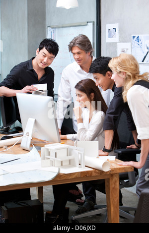 Architects working in studio Stock Photo
