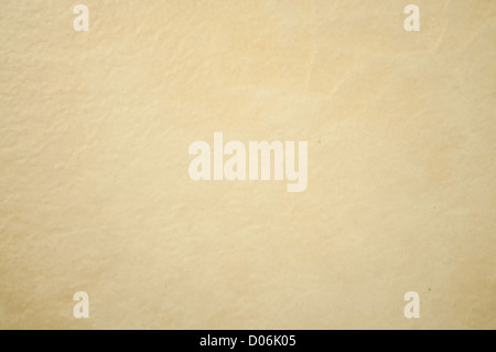 The beige color and rough texture ceramic tile background. Stock Photo