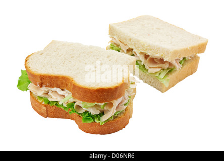 A ham salad sandwich made with freshly sliced bread cut in half with focus on the filling Stock Photo
