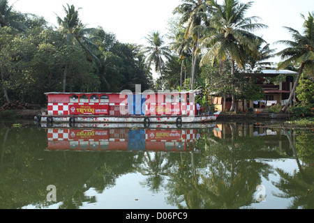 A floating super market on the back waters of alleppey. Stock Photo