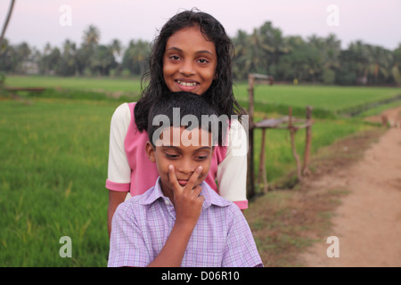 Siblings pose for the camera in kerala. Stock Photo