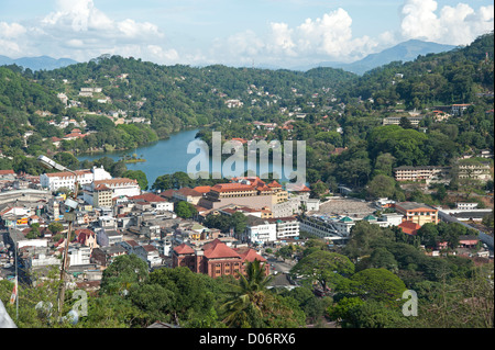 A view from above of the city of Kandy Sri Lanka showing the surrounding mountains the temple of the tooth and the man made lake Stock Photo