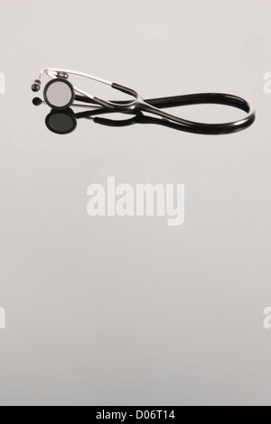 Stethoscope on white and graduated background Stock Photo - Alamy