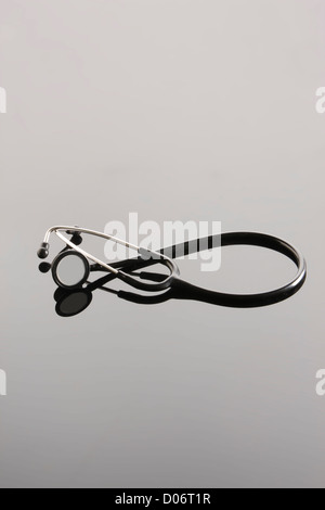 Stethoscope on white and graduated background Stock Photo - Alamy