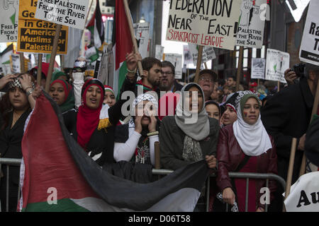 Simultaneous Demonstrations from pro-Palestinian & pro-Israeli groups  in Times Square, NYC, concerning the present attacks from both sides. Pro-Palestinian demonstrators Stock Photo