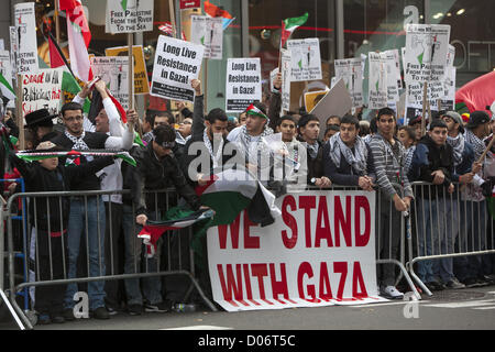 Simultaneous Demonstrations from pro-Palestinian & pro-Israeli groups  in Times Square, NYC, concerning the present attacks from both sides. Pro-Palestinian demonstrators Stock Photo