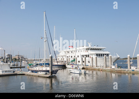 Man and woman pilot boat out of Fernandina Harbor Marina in Fernandina Beach, Amelia Island, Florida Stock Photo