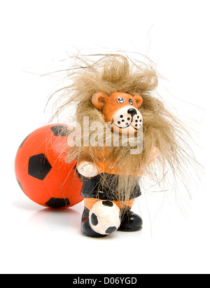 Orange soccer ball and lion isolated on white background Stock Photo