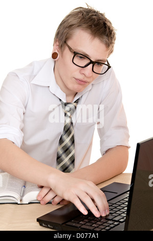 a male student works on the laptop isolated on white background Stock Photo