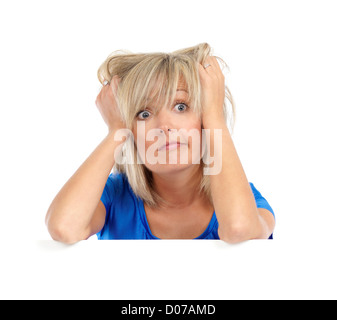 Emotional humorous portrait of a desperate woman pulling her hair. Isolated on white background. Stock Photo