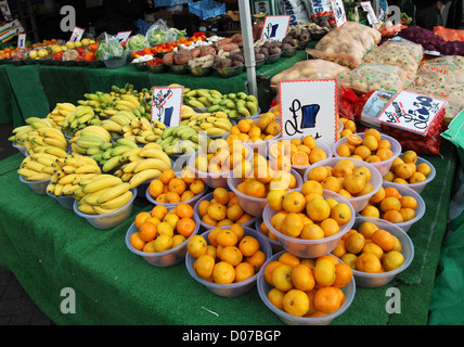 Oranges and Bananas on sale at Chichester open air market England UK Stock Photo