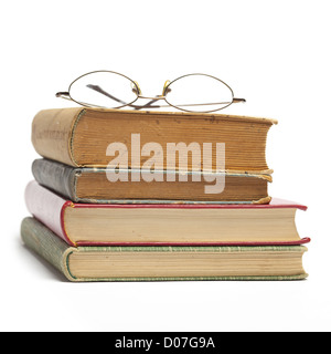 Group of Old Books And Glasses Stock Photo