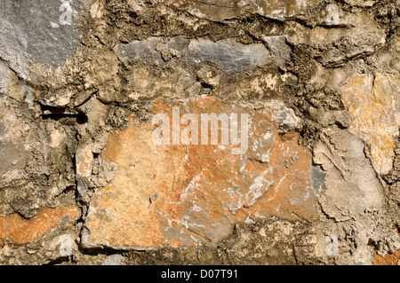 Colorful Stones set in Clay used as a background Stock Photo
