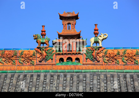 China, Shanxi Province, Pingyao County, Pingyao Ancient City, Erlang Temple, Colored glazed tiled roof. Stock Photo