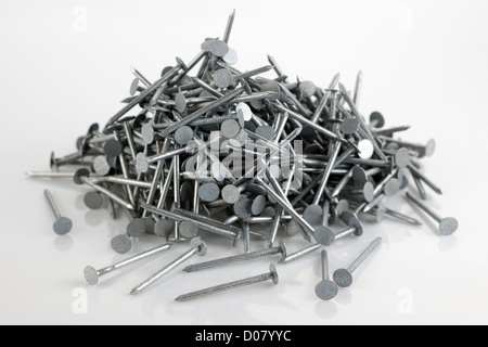 Pile of 50mm galvanised felt nails Stock Photo