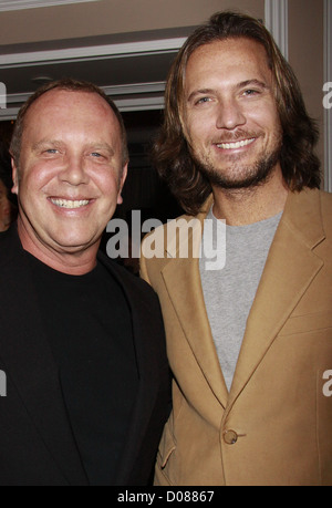Fashion designer Michael Kors, left, and his husband Lance LePere, right,  attend the Roundabout Theatre Company 2022 Gala at the Ziegfeld Ballroom on  Monday, March 7, 2022, in New York. (Photo by