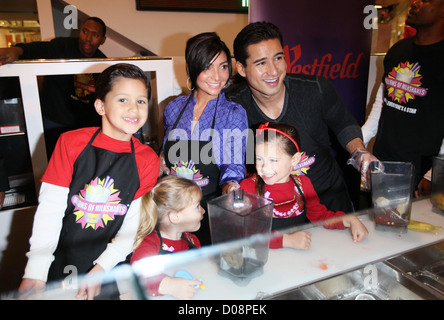 Mario Lopez, girlfriend Courtney Mazza and his family visit Millions of Milkshakes, he concocts a custom shake called the Stock Photo