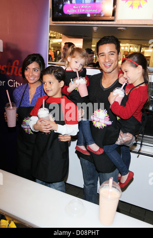 Mario Lopez, girlfriend Courtney Mazza and his family visit Millions of Milkshakes, he concocts a custom shake called the Stock Photo