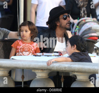 Naveen andrews lunch friend children hi-res stock photography and