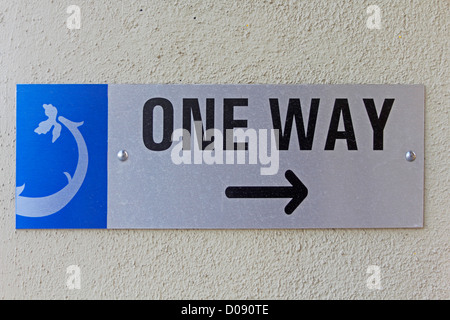 A noticeboard indicating One Way Stock Photo