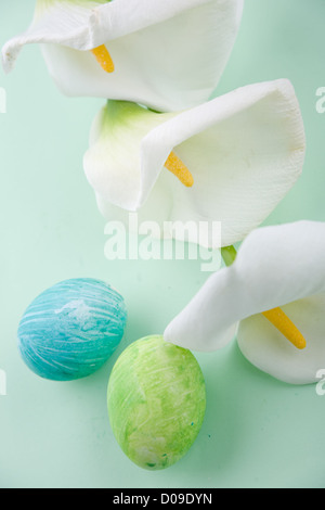 Calla lilies and Easter eggs Stock Photo