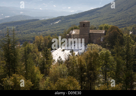 A view from the tiny hilltop village of Gigors of the Romanesque St Peter’s Church and the mountainous landscape of the Vercors. La Drôme, France. Stock Photo