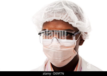 Handsome man dressed as doctor physician scientist surgeon or working in food industry, with mouth and hair cap for hygiene Stock Photo