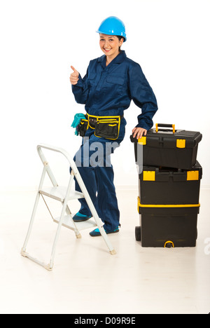 Successful builder woman giving thumb up isolated on white background Stock Photo