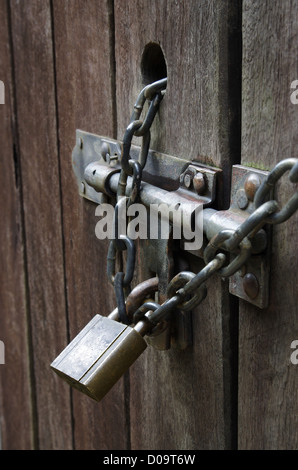 chain with a security bolt and padlock Stock Photo