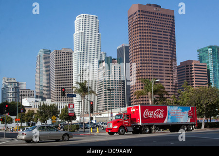 COCA-COLA DELIVERY TRUCK CROSSING AN INTERSECTION IN DOWNTOWN LOS ANGELES SKYLINE OF LOS ANGELES CALIFORNIA UNITED STATES USA Stock Photo