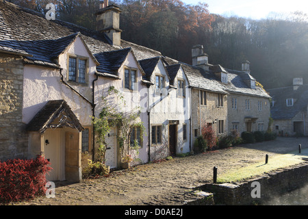 The picturesque cotswold village of Castle Combe, with its pretty cottages. Which have been used in many films and TV programs Stock Photo