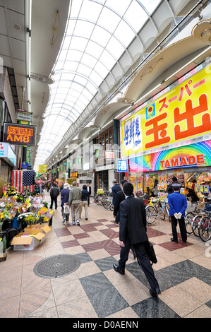 Tenjinbashi-suji shopping street. At about 2.6km, it's Japan's longest covered shopping street. Stock Photo