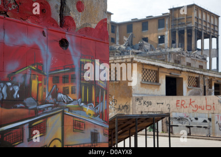 GRAFFITI BURNING REFRIGERATORS ON DISUSED CASABLANCA SLAUGHTERHOUSES URBAN WASTELAND REINFORCED CONCRETE LEGACY MARECHAL Stock Photo