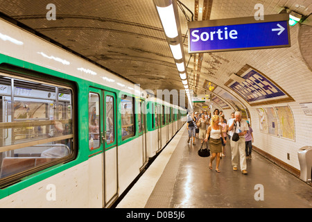 People getting off the  Paris Metro underground  train at Abbesses station Montmartre Paris France EU Europe Stock Photo