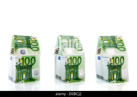 Row green and orange money houses from European banknotes Stock Photo