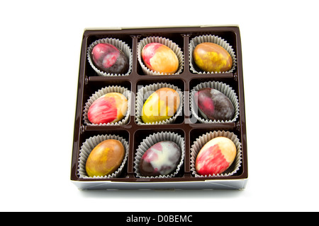 colorful chocolate eggs in a box isolated on white background Stock Photo
