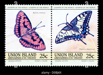 Postage stamps from Union Island depicting Spotted Joker  and Old World Swallowtail (Byblia ilithyia and Papilio machaon) Stock Photo