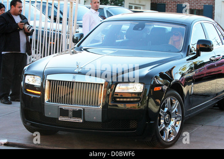 Paris Hilton picks up her new Rolls-Royce Ghost from luxury car dealership in West Hollywood. The jet black 'top marque' Stock Photo