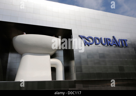 People on the bowl of the toilet outside the Duravit Design Centre, Hornberg, Black Forest, Germany. Stock Photo