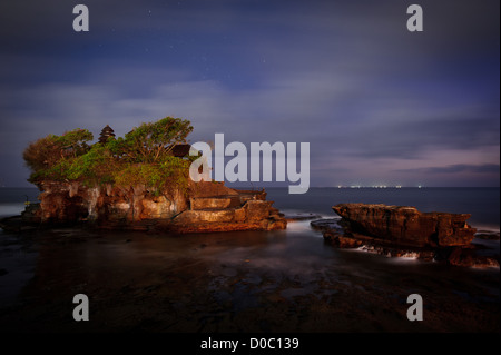 A long exposure of Tanah Lot Temple. taken after sunset when everybody left. Bali, Indonesia Stock Photo
