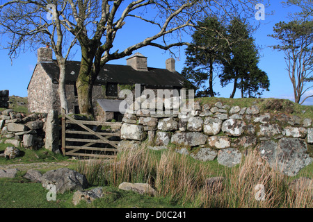 old empty stone built house on sunny day Stock Photo