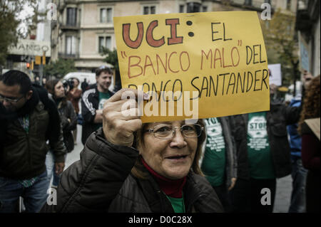 Barcelona, Spain. 22nd November 2012. Woman protesting agains mortgage and eviction procedures of UCI -Banco Santander credit bank-. Credit:  esteban mora / Alamy Live News Stock Photo