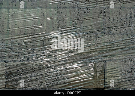 Background from a packing film with water drops. Variant 1. Stock Photo