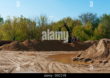 Sand unloading from railway platforms Stock Photo - Alamy