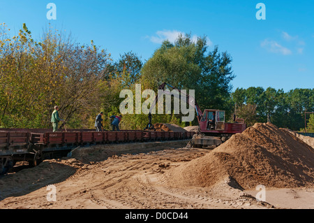 Sand unloading from railway platforms. Variant 2 Stock Photo - Alamy