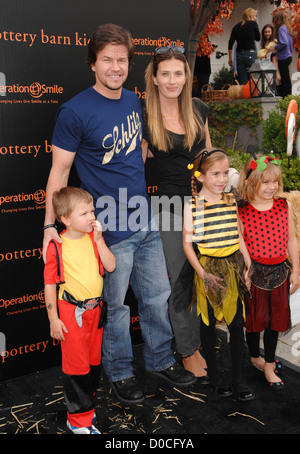 Mark Wahlberg, Rhea Durham and their children Celebrities at Pottery Barn Kids Halloween Carnival Los Angeles, USA - 23.10.10 Stock Photo