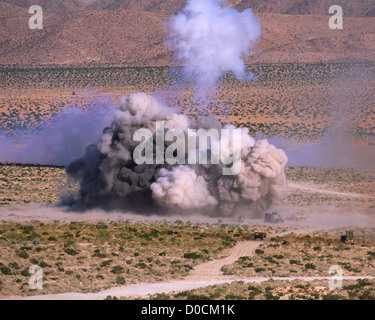 Massive Explosion of the Detonation of a Mine Clearing Line Charge Stock Photo